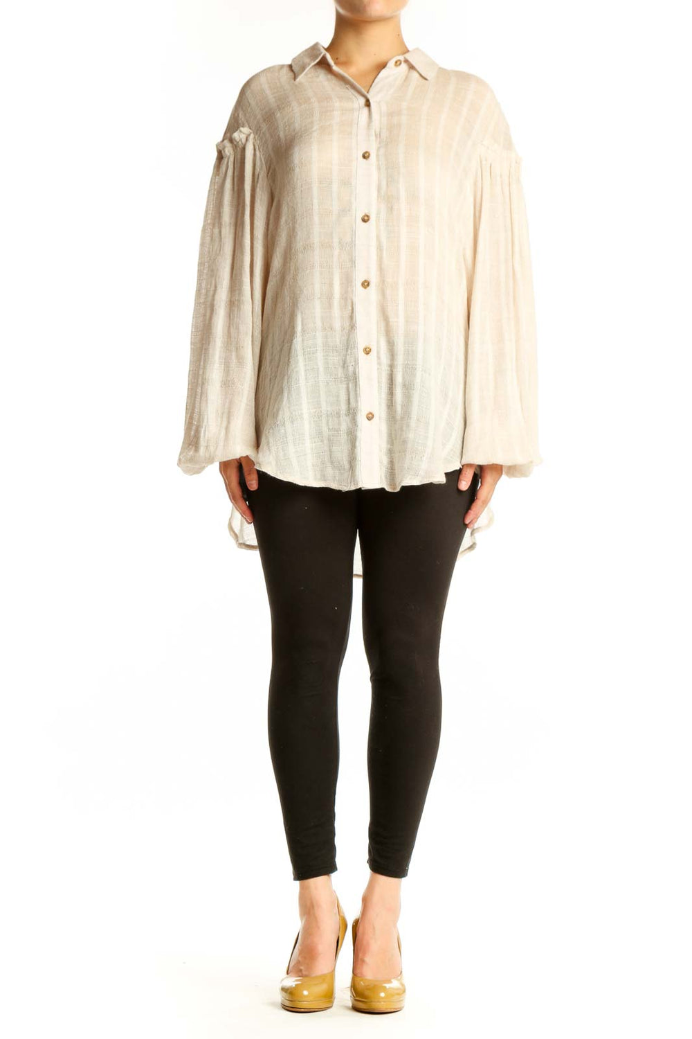 Free People cream button-up blouse with voluminous bell sleeves and striped texture, front view
