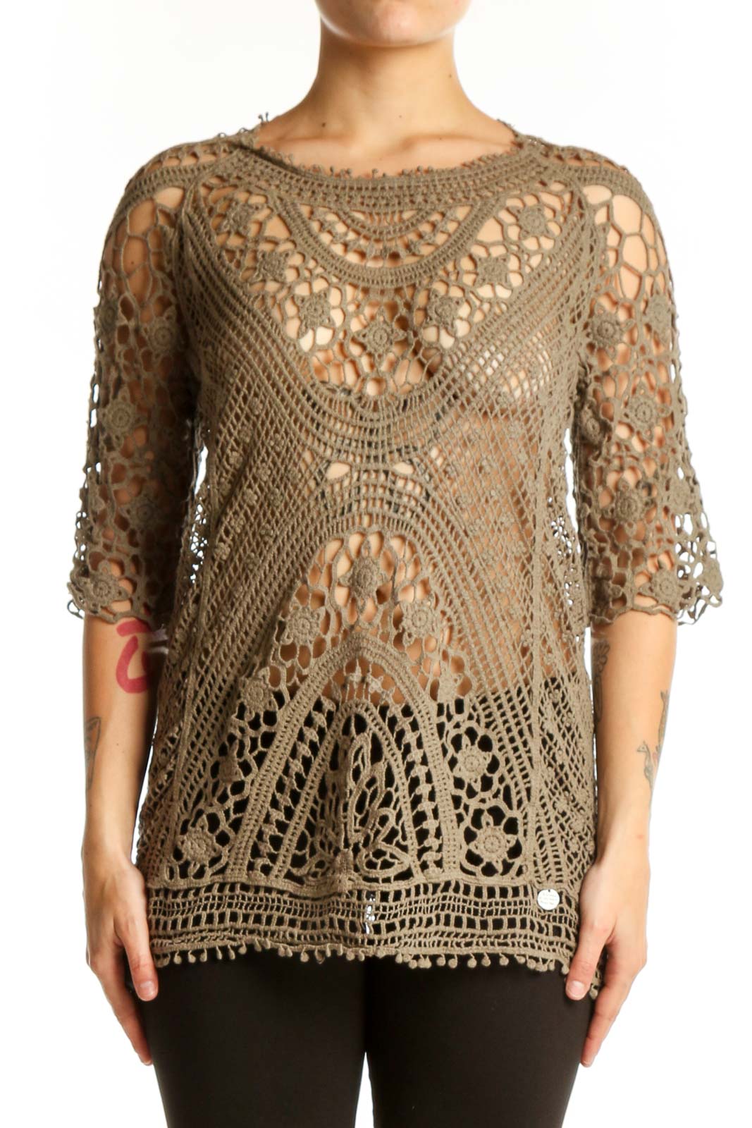 Beige crochet lace knit top with intricate open-weave pattern and three-quarter sleeves, front view
