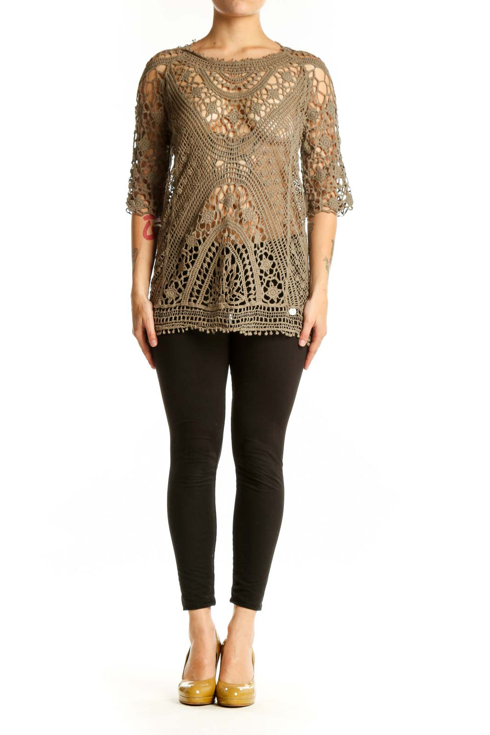 Beige crochet lace knit top with intricate open-weave pattern and three-quarter sleeves, front view
