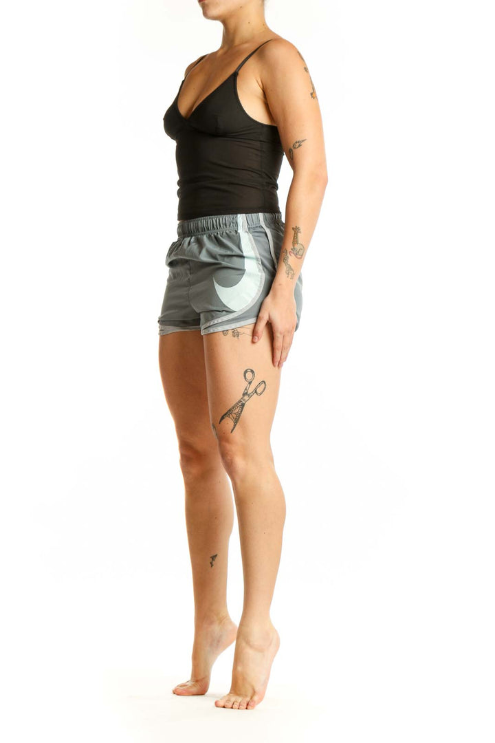 Gray Nike Dri-FIT Athletic Shorts front view with white Swoosh logo on thigh
