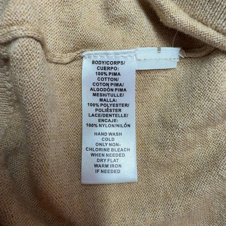 Tag view of beige LOFT cardigan showing lace trim detail and button-front design