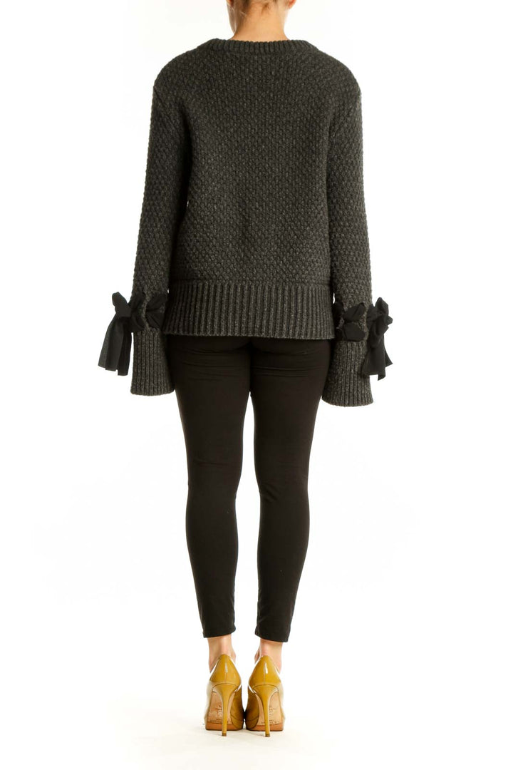 Gray alpaca-blend pullover sweater with bow cuff details, back view
