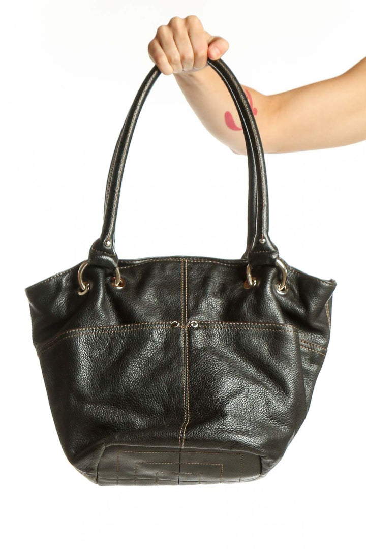 Black genuine leather shoulder tote bag by Tignanello with dual handles and structured design