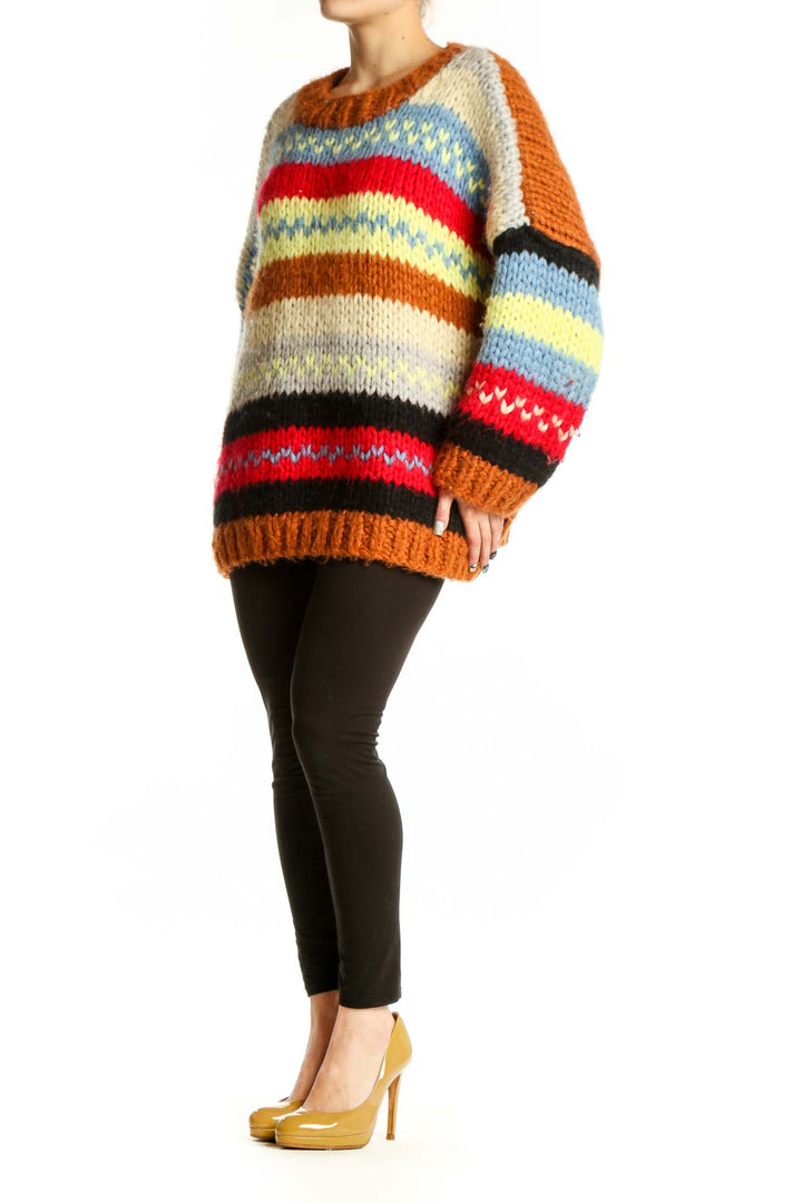 LASSONG multicolor striped knit pullover sweater with horizontal stripes in red, orange, cream, blue, yellow, and black, front view on model