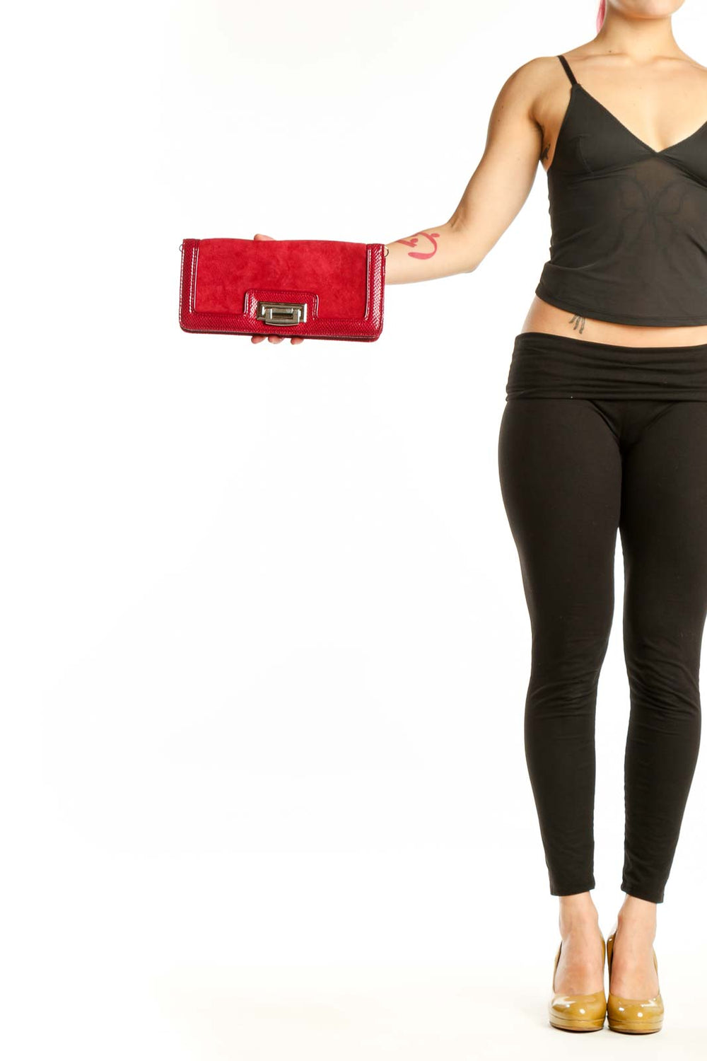 Red leather clutch with textured suede sides and gold-tone flip-lock hardware by White House Black Market