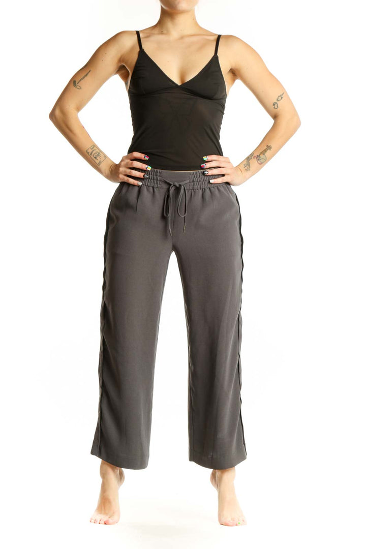 Gray drawstring cropped pants with elastic waistband and wide-leg fit, front view