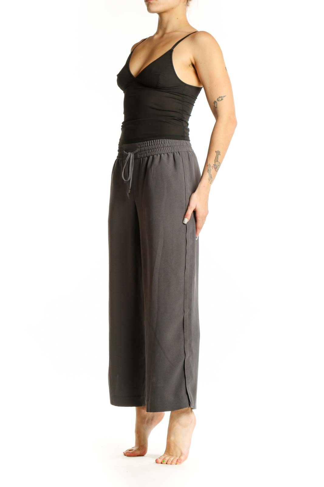 Gray drawstring cropped pants with elastic waistband and wide-leg fit, front view