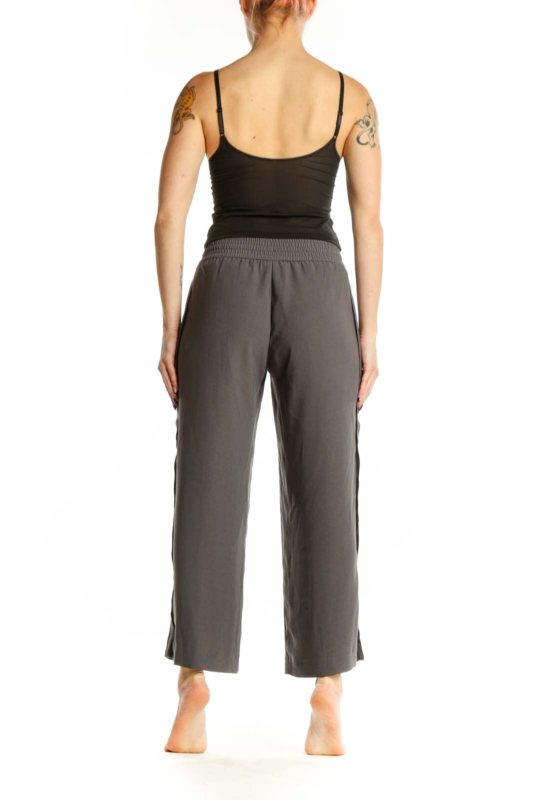 Gray drawstring cropped pants back view showing relaxed silhouette and ankle length