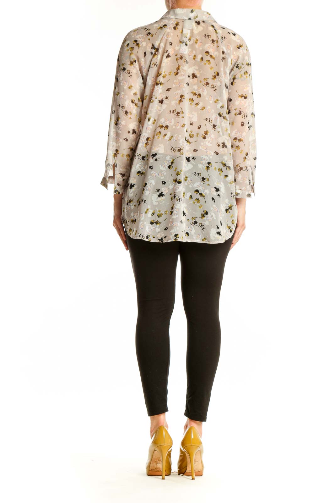 Back view of cream floral print Cabi button-up shirt showing relaxed fit and full botanical print design
