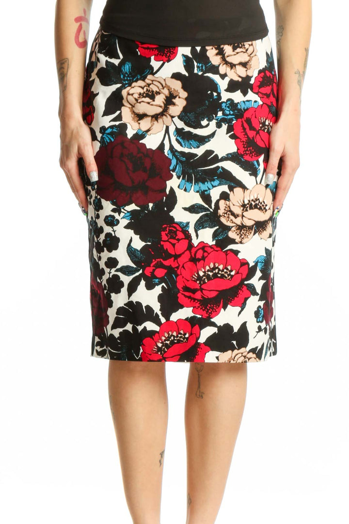 Adrianna Papell multicolor floral pencil skirt front view featuring red peonies, cream blooms, and teal accents on black background