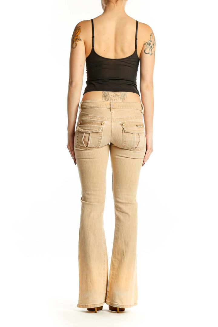 Roberto Cavalli cream flare denim jeans back view showing flattering fit and flared leg silhouette