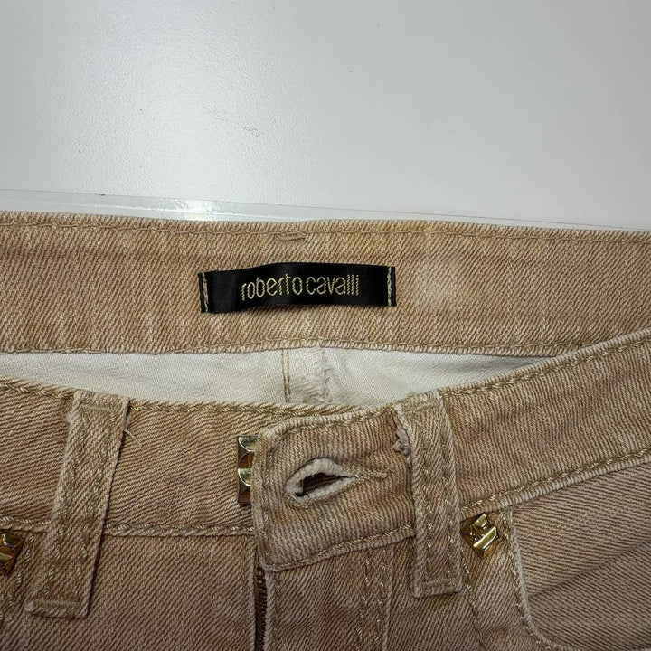 Roberto Cavalli cream flare denim jeans back view showing flattering fit and flared leg silhouette