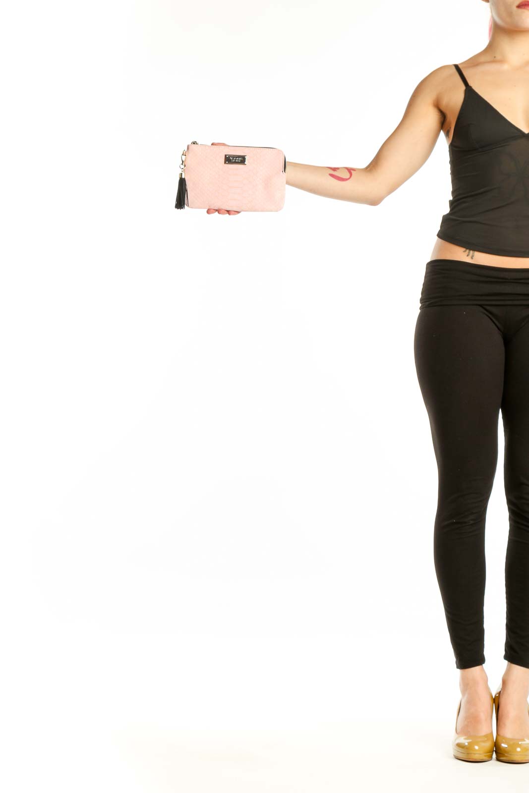 Pink quilted clutch with black tassel charm and gold hardware from Victoria's Secret