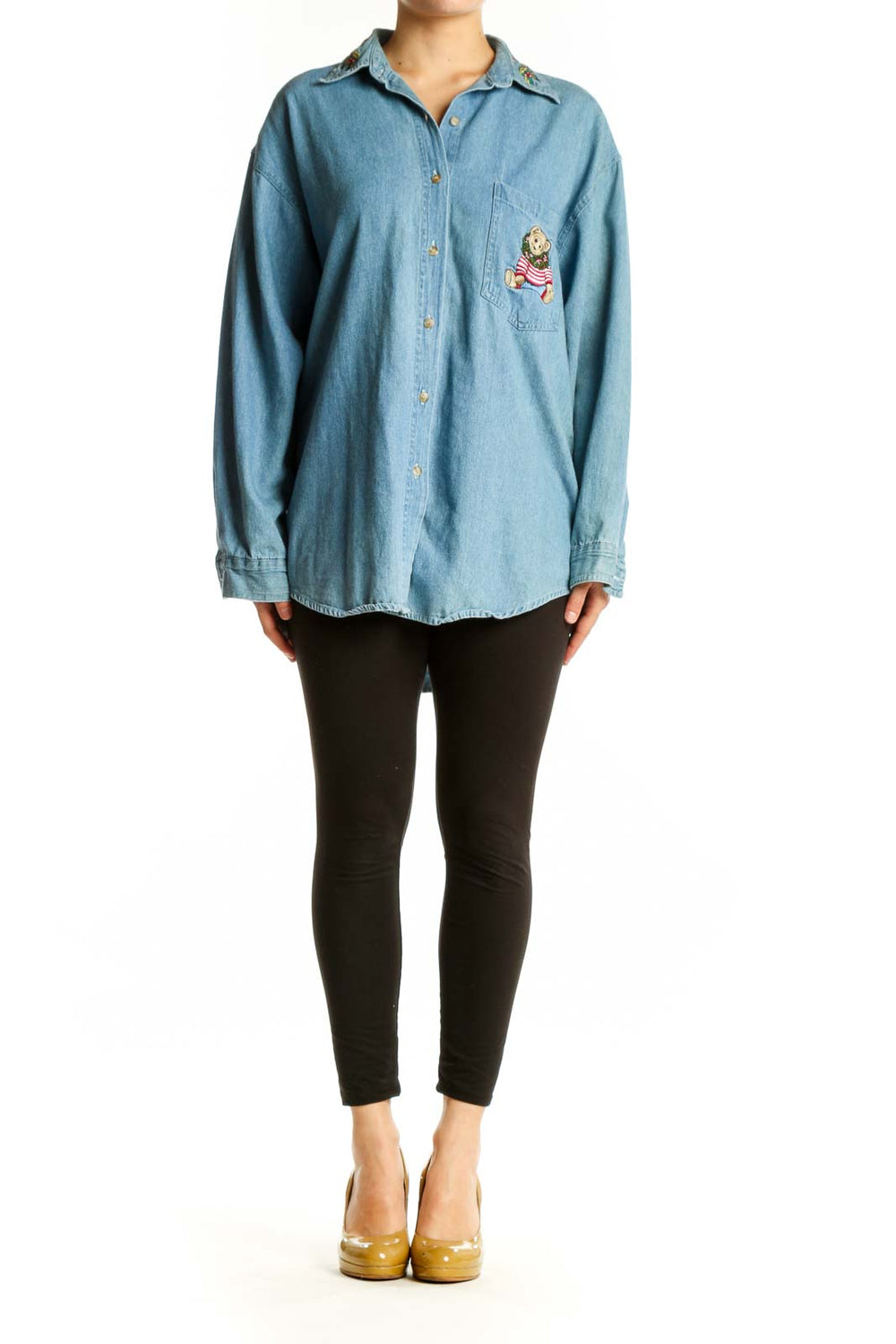 Light blue denim button-up shirt with teddy bear embroidery on chest pocket, front view
