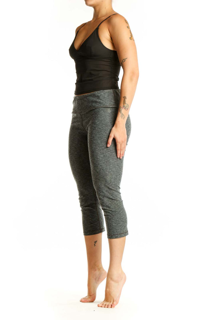 Gray heathered capri leggings with high-waisted waistband, front view