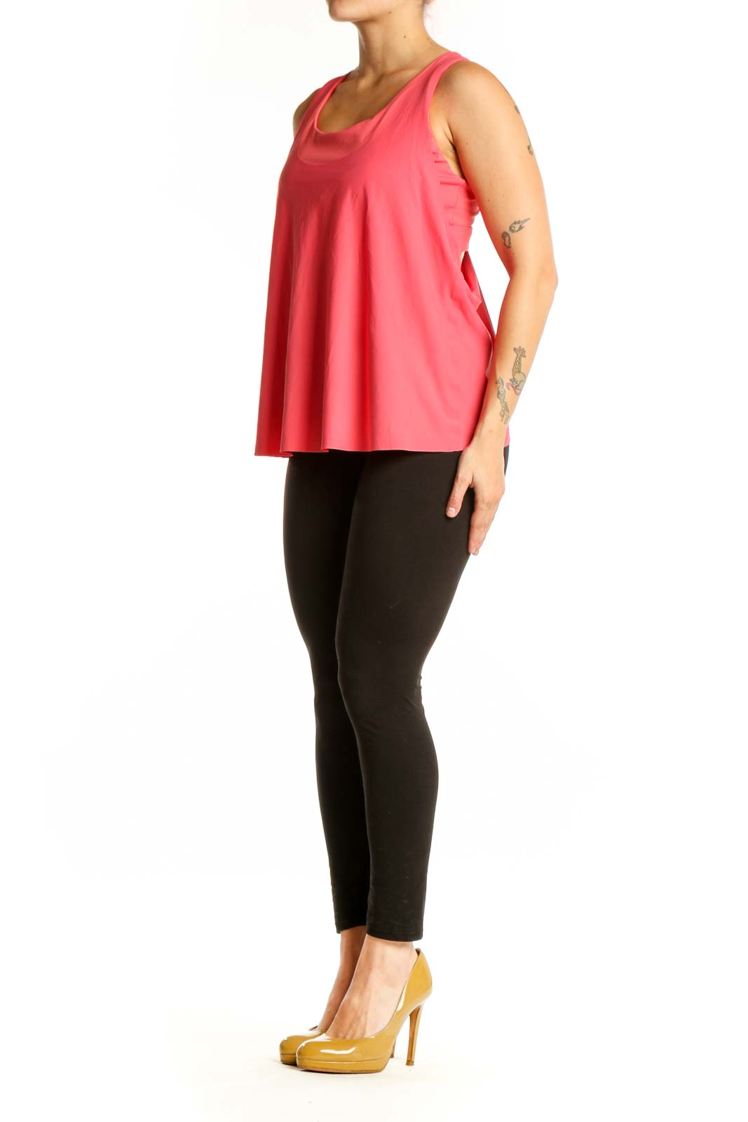 Front view of pink Athleta sleeveless tank top with scoop neckline on model