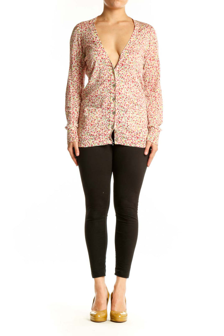 Pink floral cotton silk cardigan with button-front closure and long sleeves, front view
