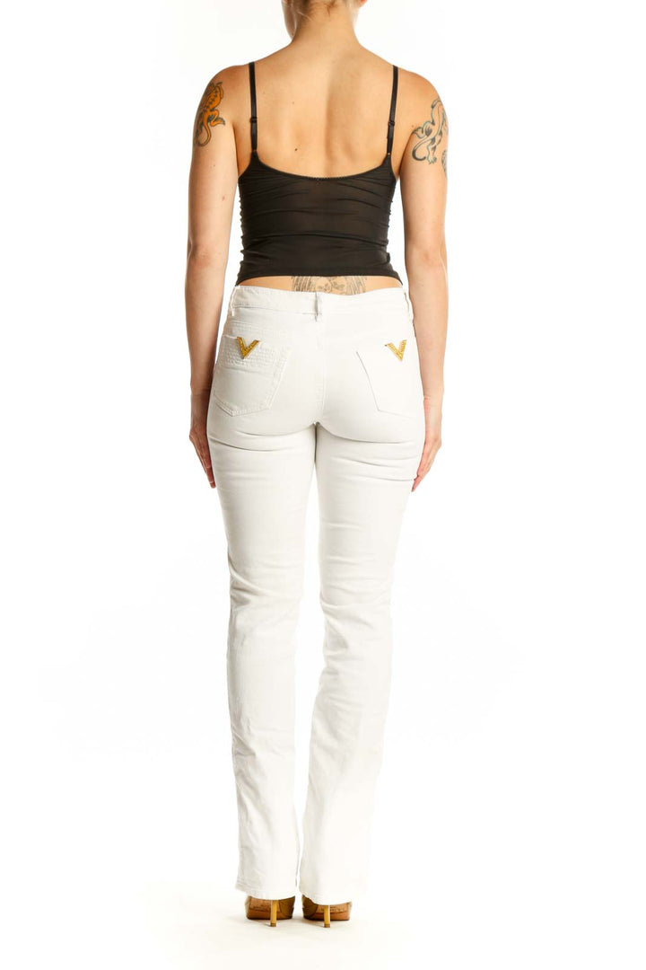 White denim straight-leg jeans by R.E.D. Valentino, back view displaying classic straight-leg silhouette and fit