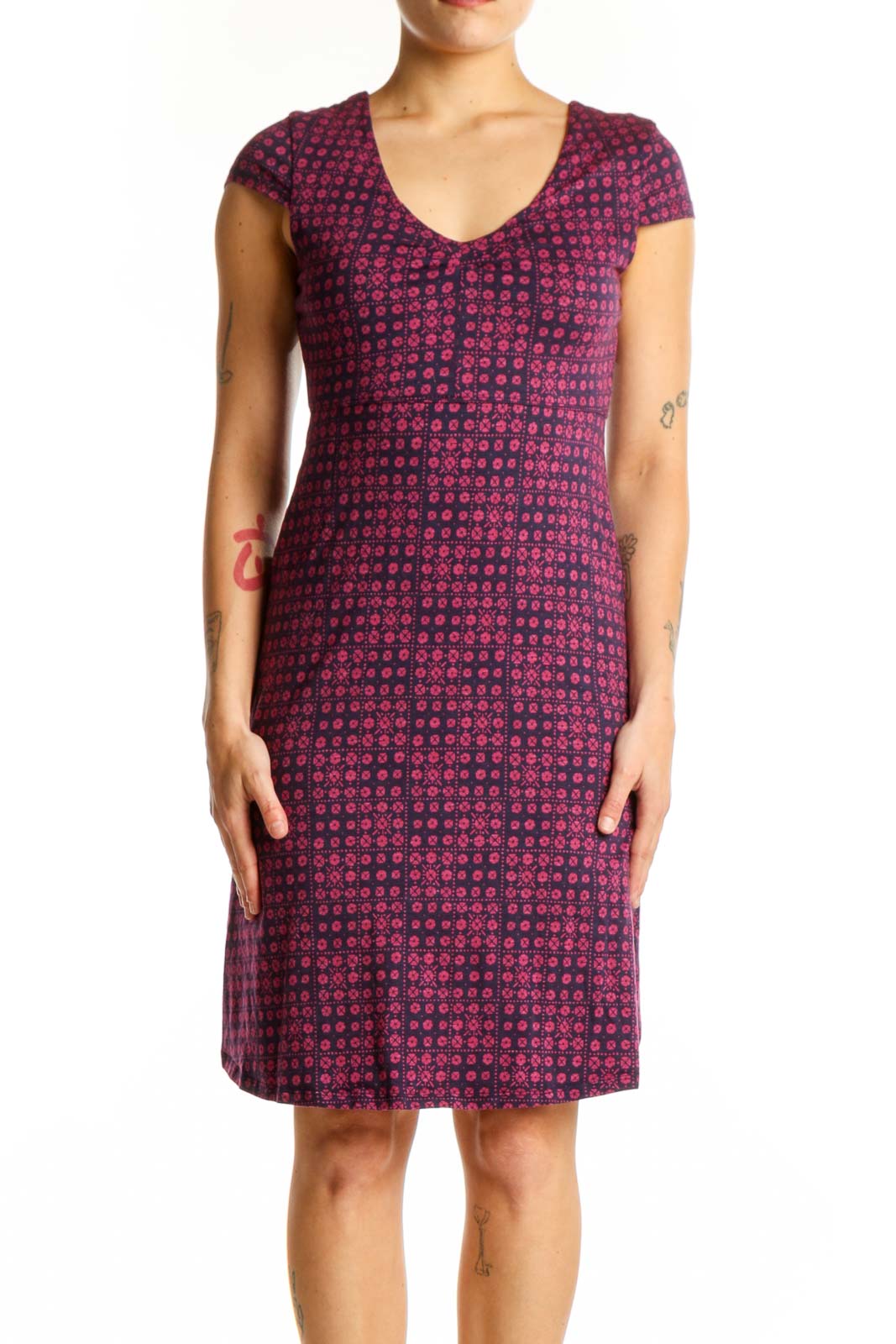 Burgundy geometric print cap sleeve dress with V-neckline, front view on model