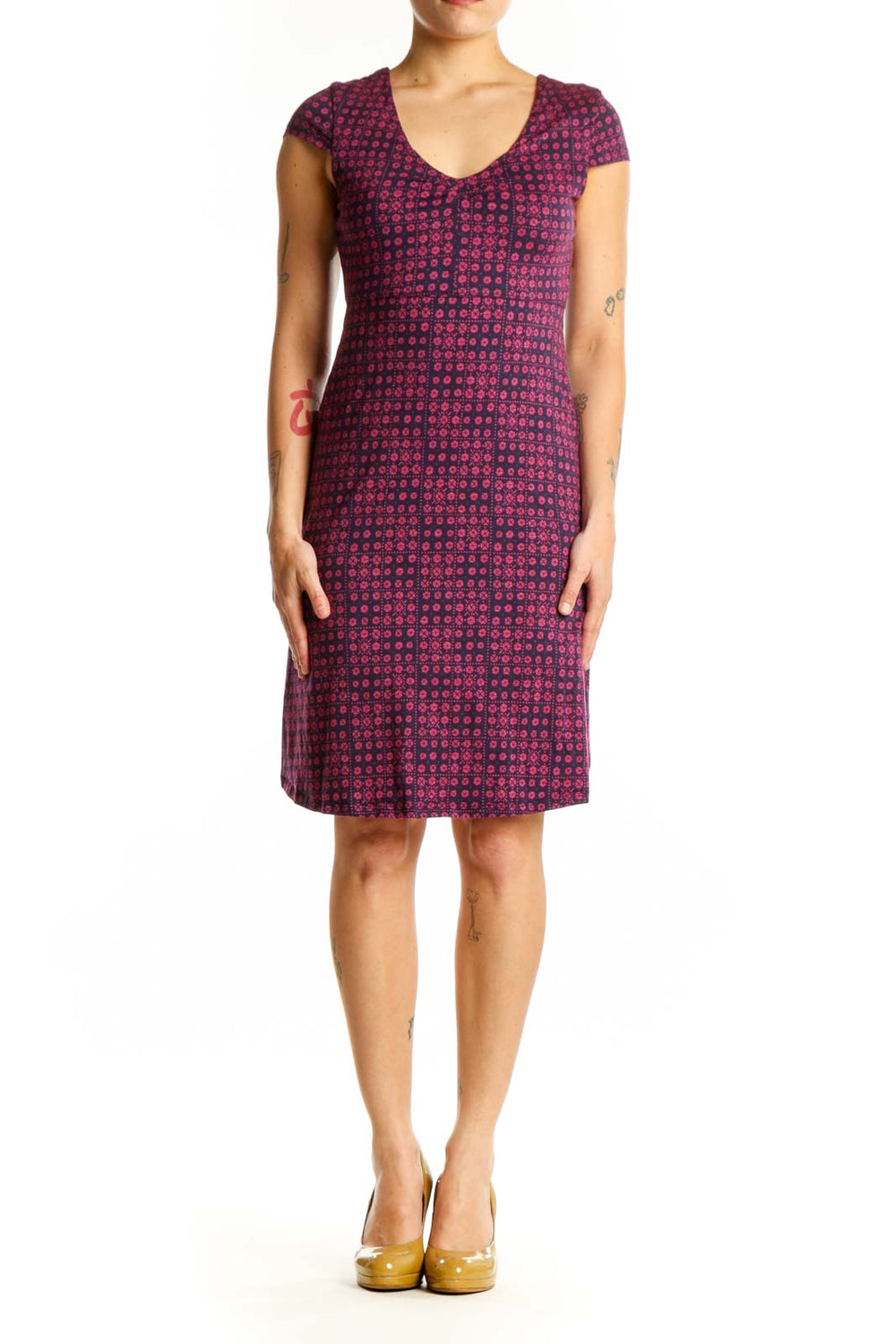 Burgundy geometric print cap sleeve dress with V-neckline, front view on model
