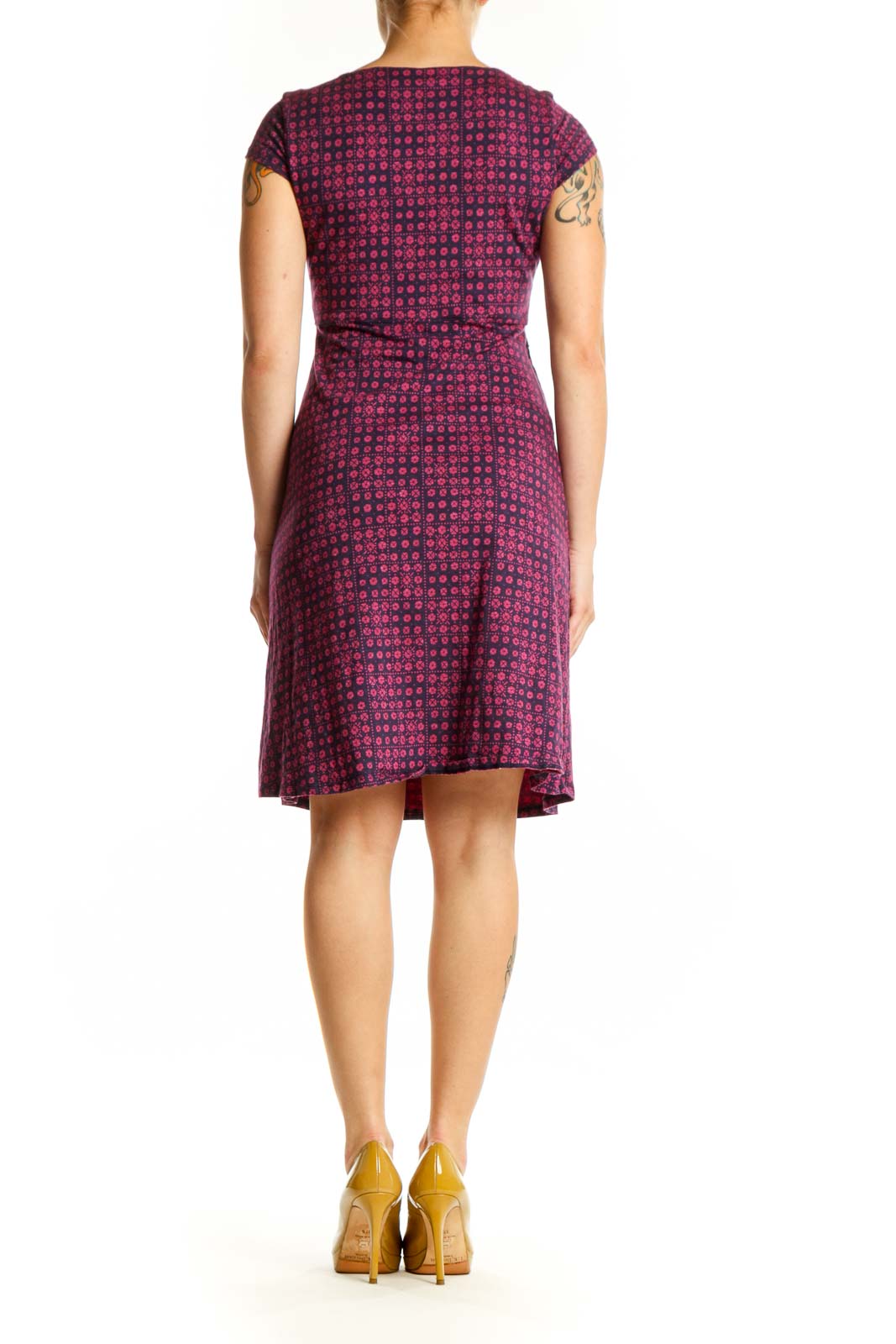 Burgundy geometric print cap sleeve dress, back view on model showing A-line silhouette