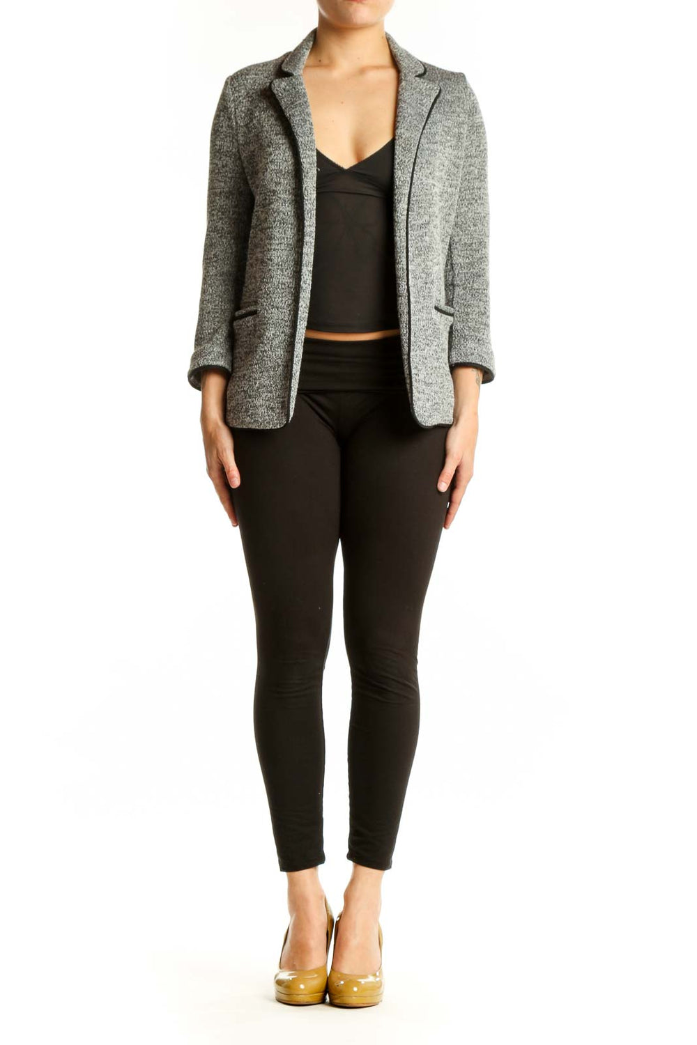 Gray heathered knit blazer with notched lapels and three-quarter sleeves worn over black crop top