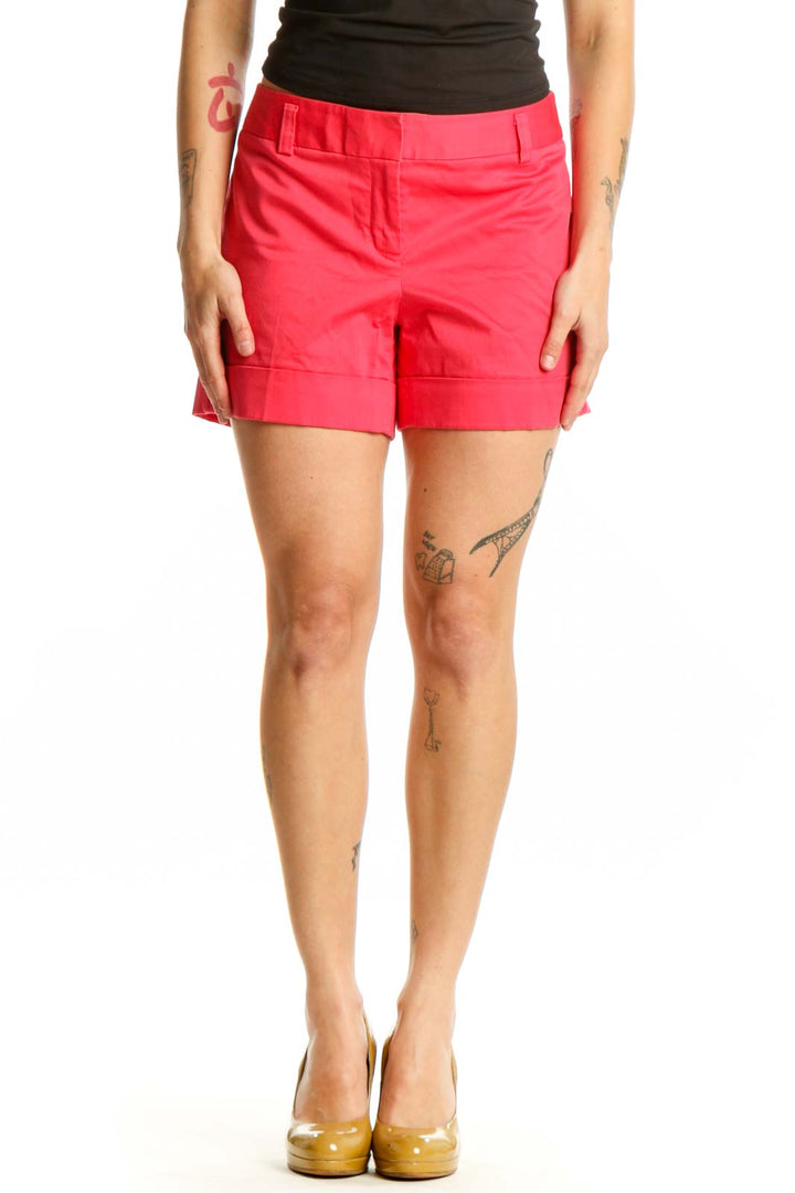Front view of red cotton-spandex tailored shorts from Express, size S, featuring zip closure and functional pockets