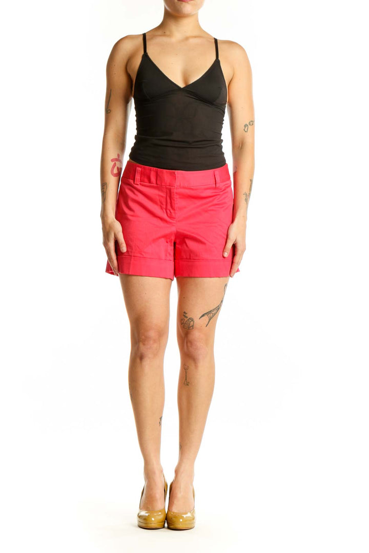 Front view of red cotton-spandex tailored shorts from Express, size S, featuring zip closure and functional pockets