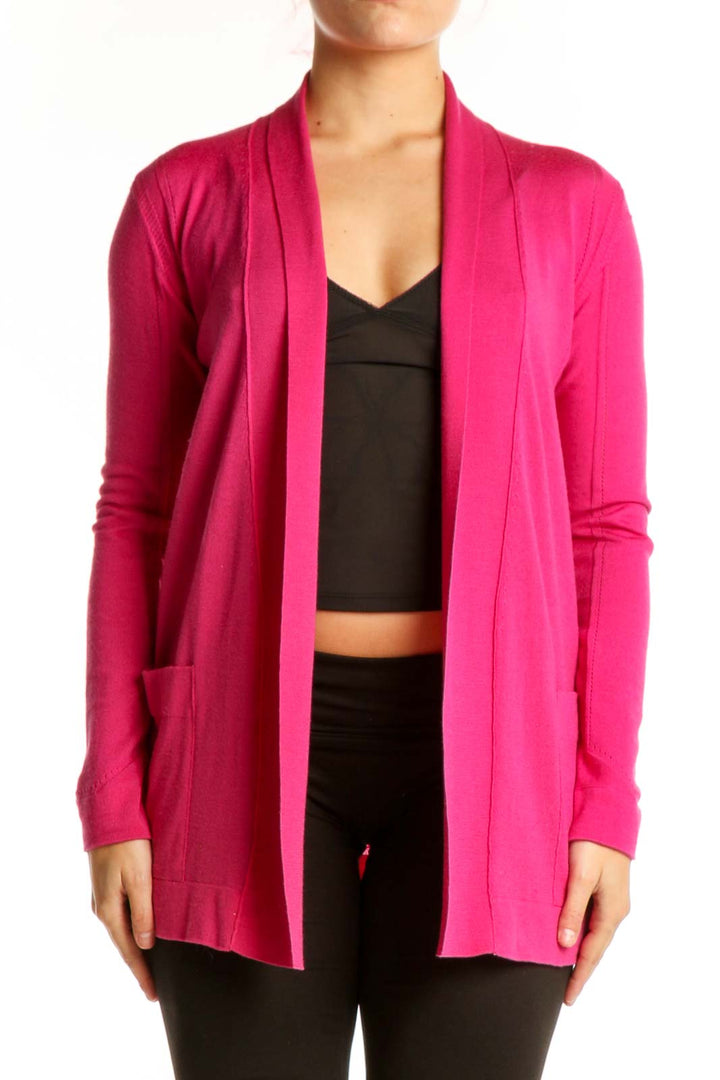 Front view of pink ESCADA silk wool cardigan worn open over black crop top, showing relaxed fit and draping
