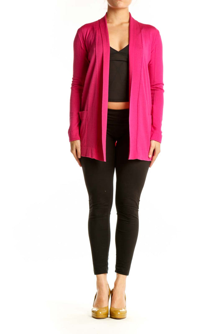 Front view of pink ESCADA silk wool cardigan worn open over black crop top, showing relaxed fit and draping