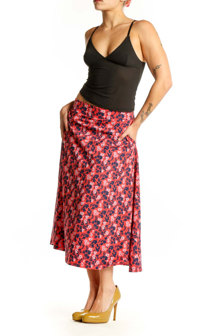 Red floral A-line midi skirt with navy and white botanical pattern, front view