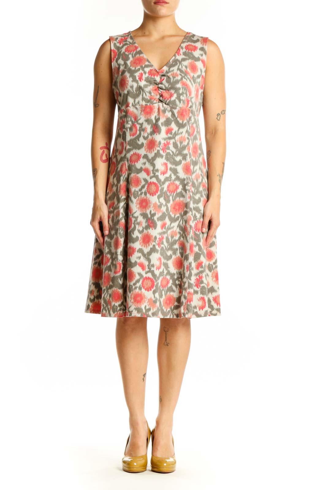 Cream floral midi dress with coral and sage botanical print, V-neckline, sleeveless design, front view