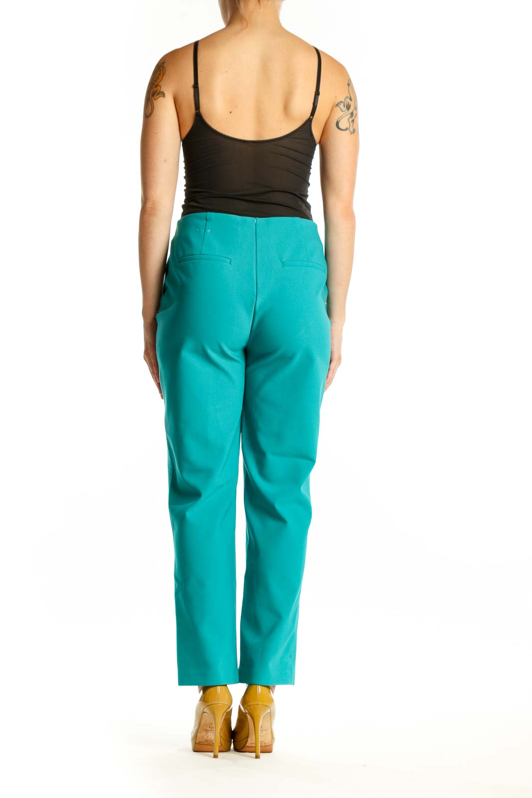Back view of teal cropped dress pants showing tailored fit and clean lines