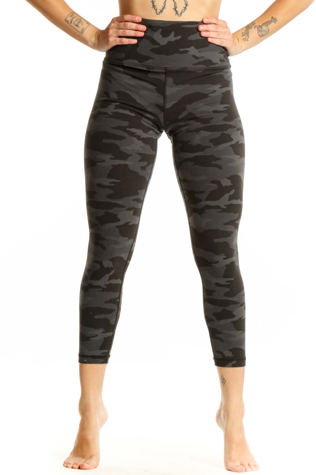 Black camouflage capri leggings with high waistband, front view on model