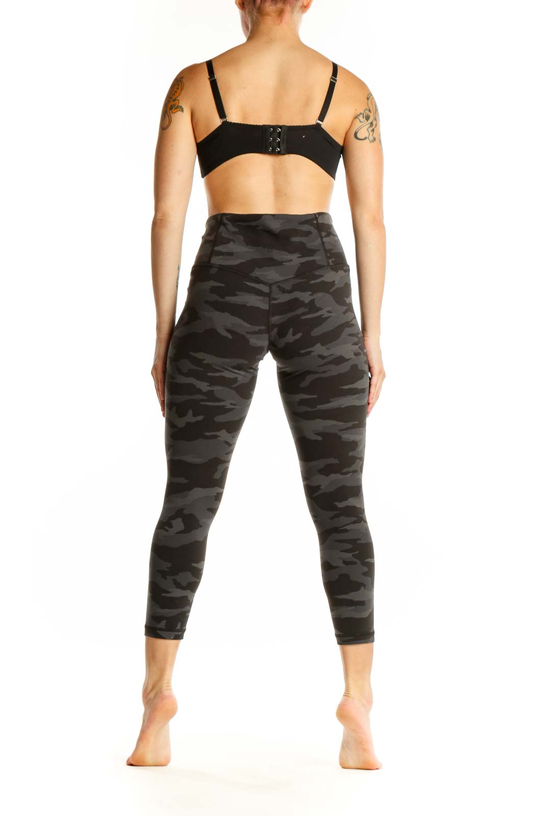 Black camo capri leggings back view showing high-waisted fit and form-fitting silhouette