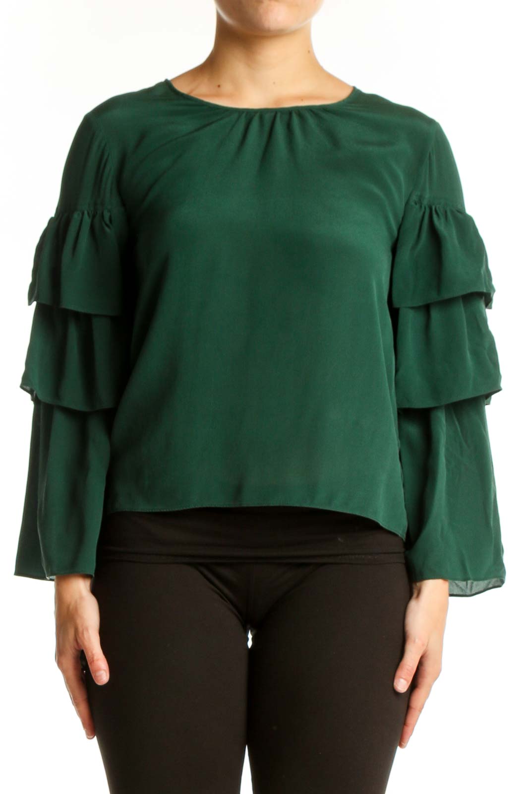 Forest green silk blouse with tiered ruffle sleeves, cropped fit, worn with black pants