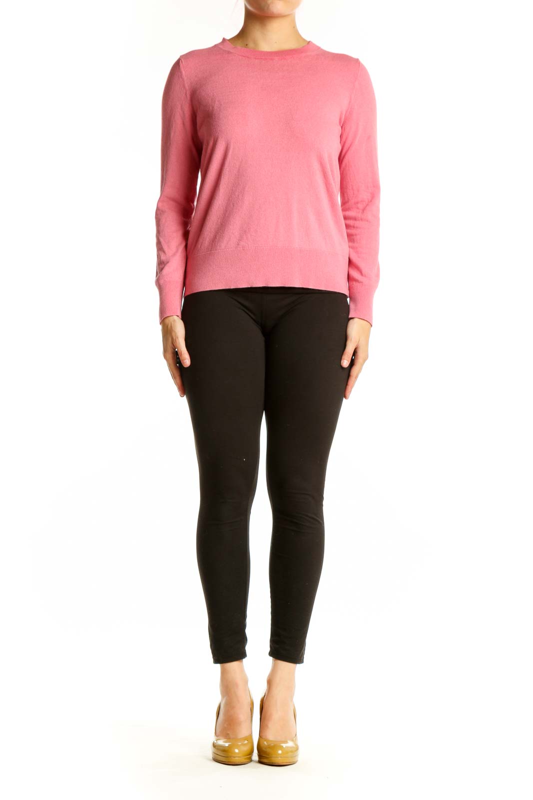 Pink cashmere silk crew neck sweater front view on model wearing black pants
