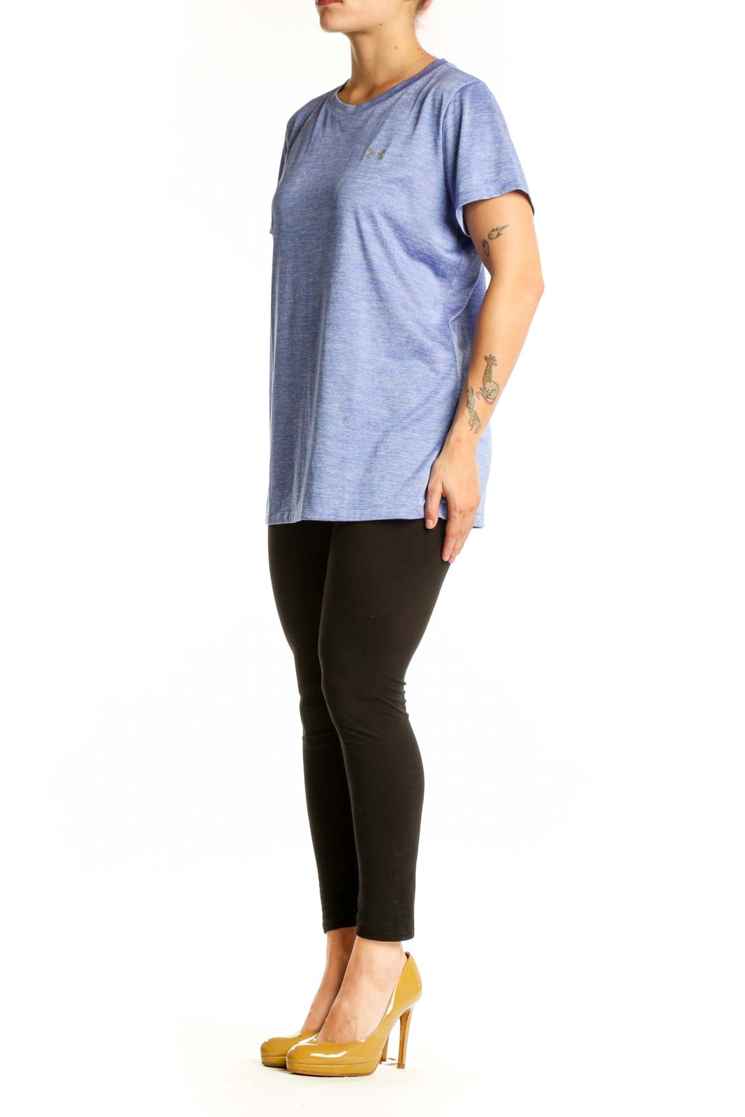 Front view of heathered blue Under Armour activewear t-shirt with crew neck and short sleeves on model