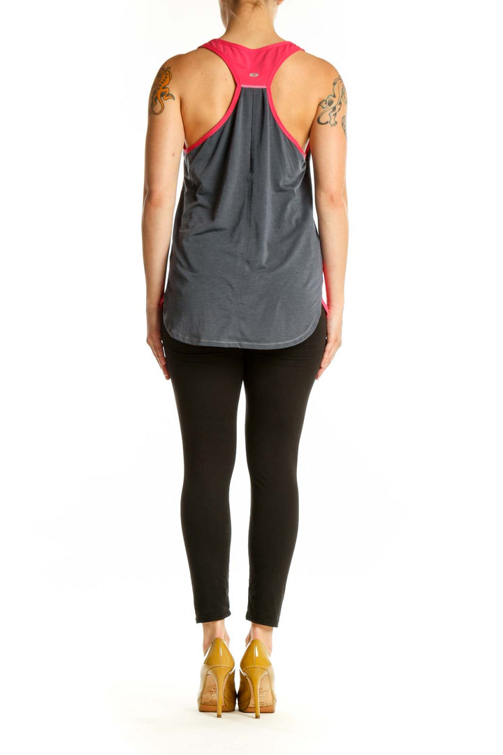 Red SUGOI athletic tank top with gray contrast back panel detail, back view