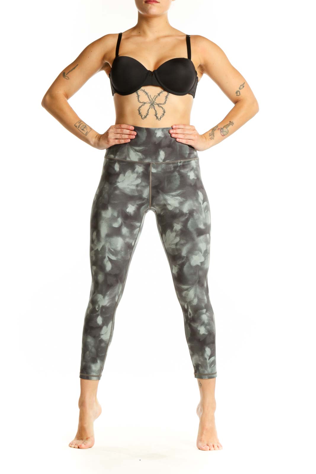 Gray tie-dye high-waisted capri leggings front view showing cropped length and four-way stretch fabric