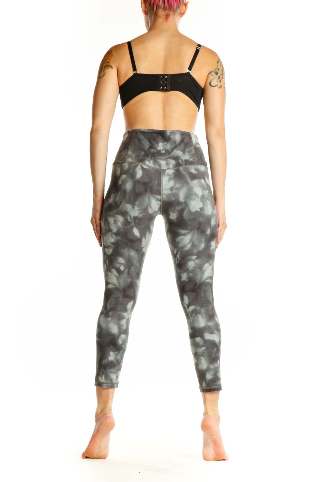 Gray tie-dye capri leggings back view displaying high-waisted design and seamless construction