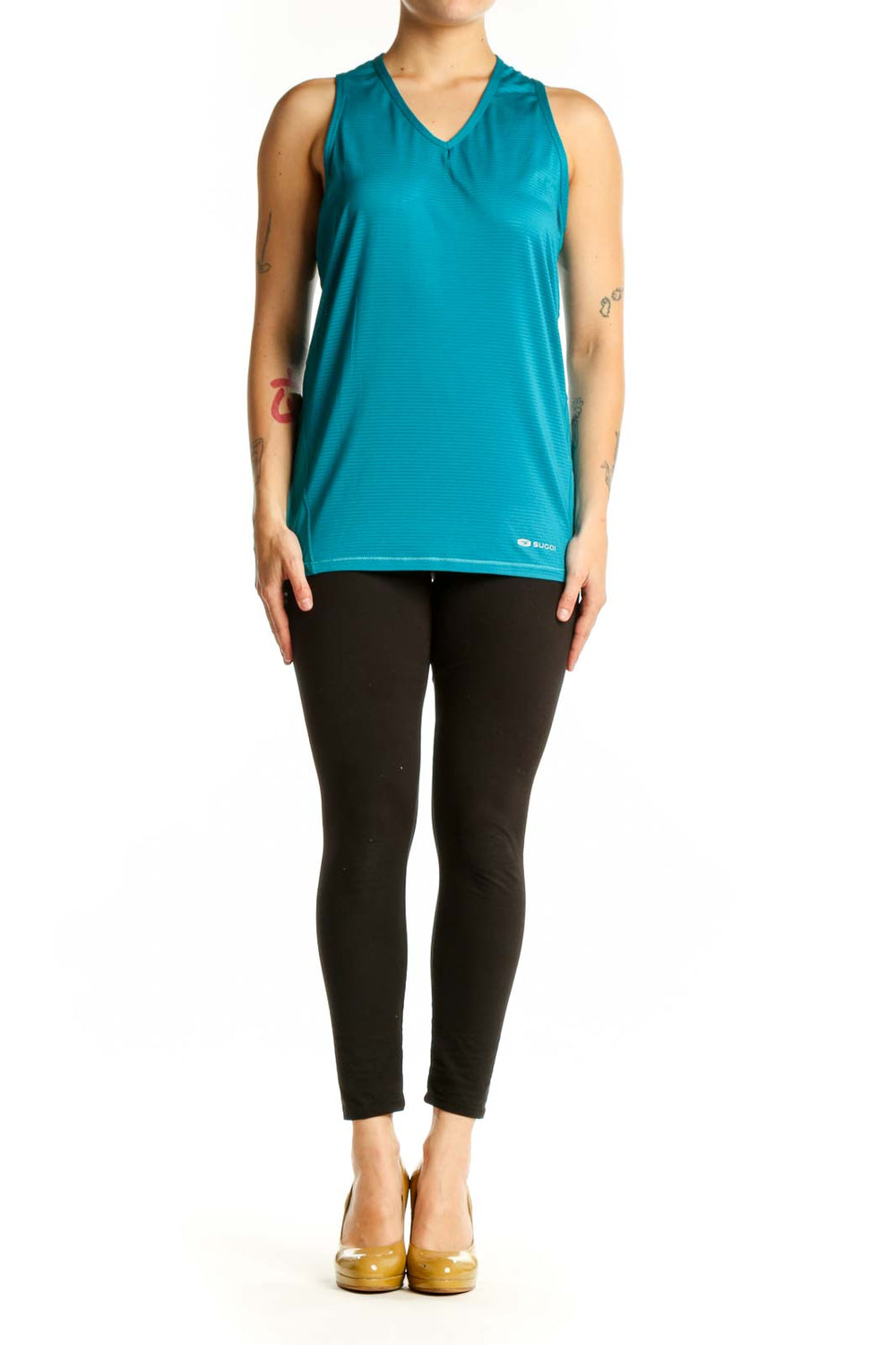Teal V-neck sleeveless activewear tank top by SUGOI, front view on model
