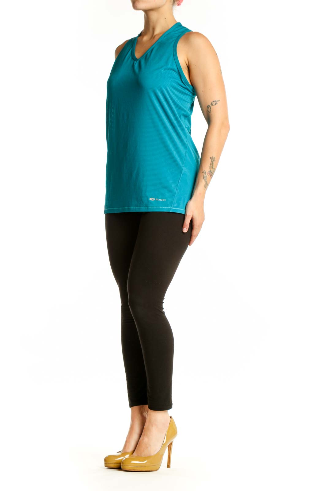 Teal V-neck sleeveless activewear tank top by SUGOI, front view on model