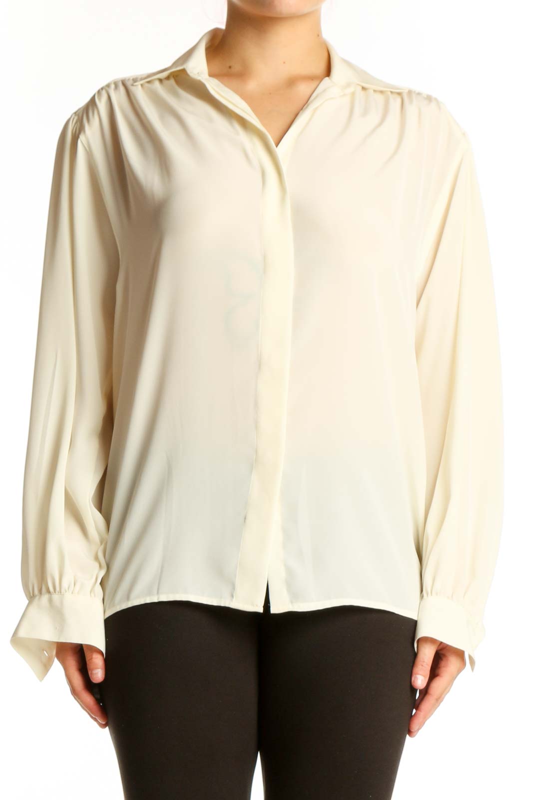 Cream button-up blouse with collared neckline and full-length sleeves, front view