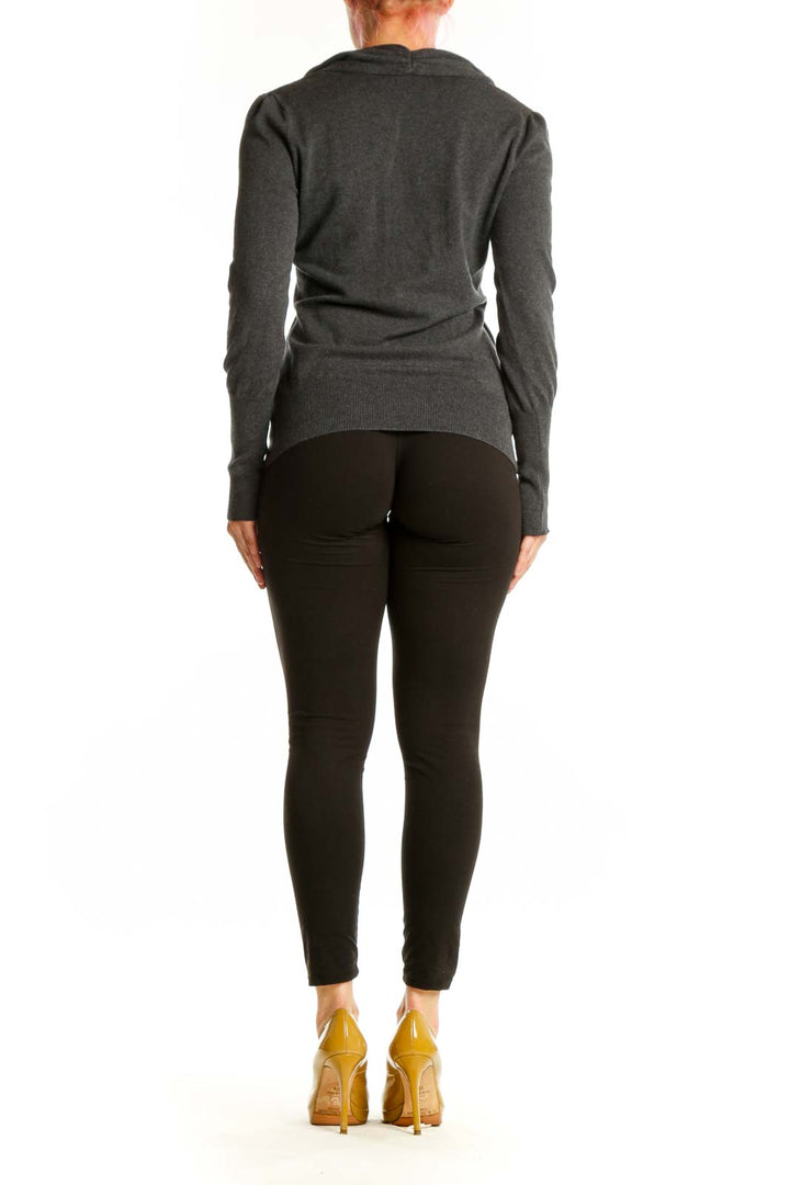 Back view of charcoal cashmere cowl neck sweater showing fitted design and elegant draping