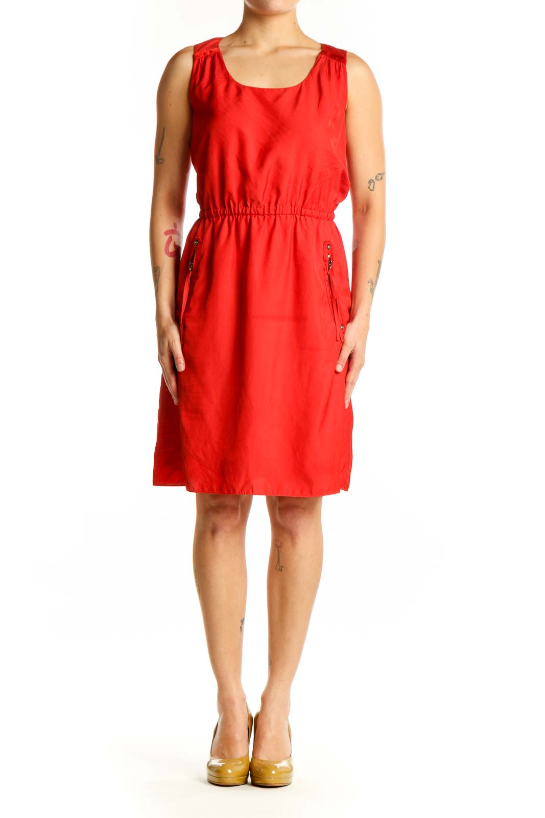 Red sleeveless A-line dress with cinched waist and side pockets, front view