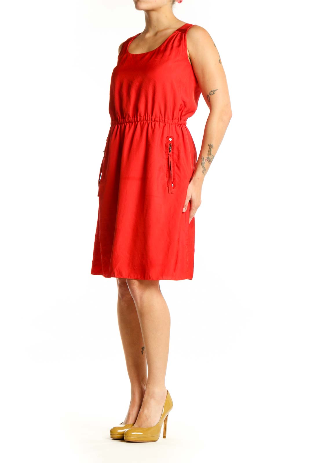 Red sleeveless A-line dress with cinched waist and side pockets, front view