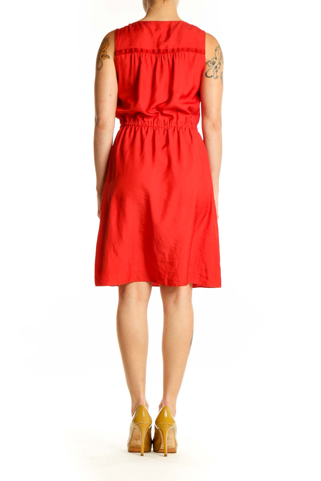 Red sleeveless A-line dress with cinched waist and side pockets, back view