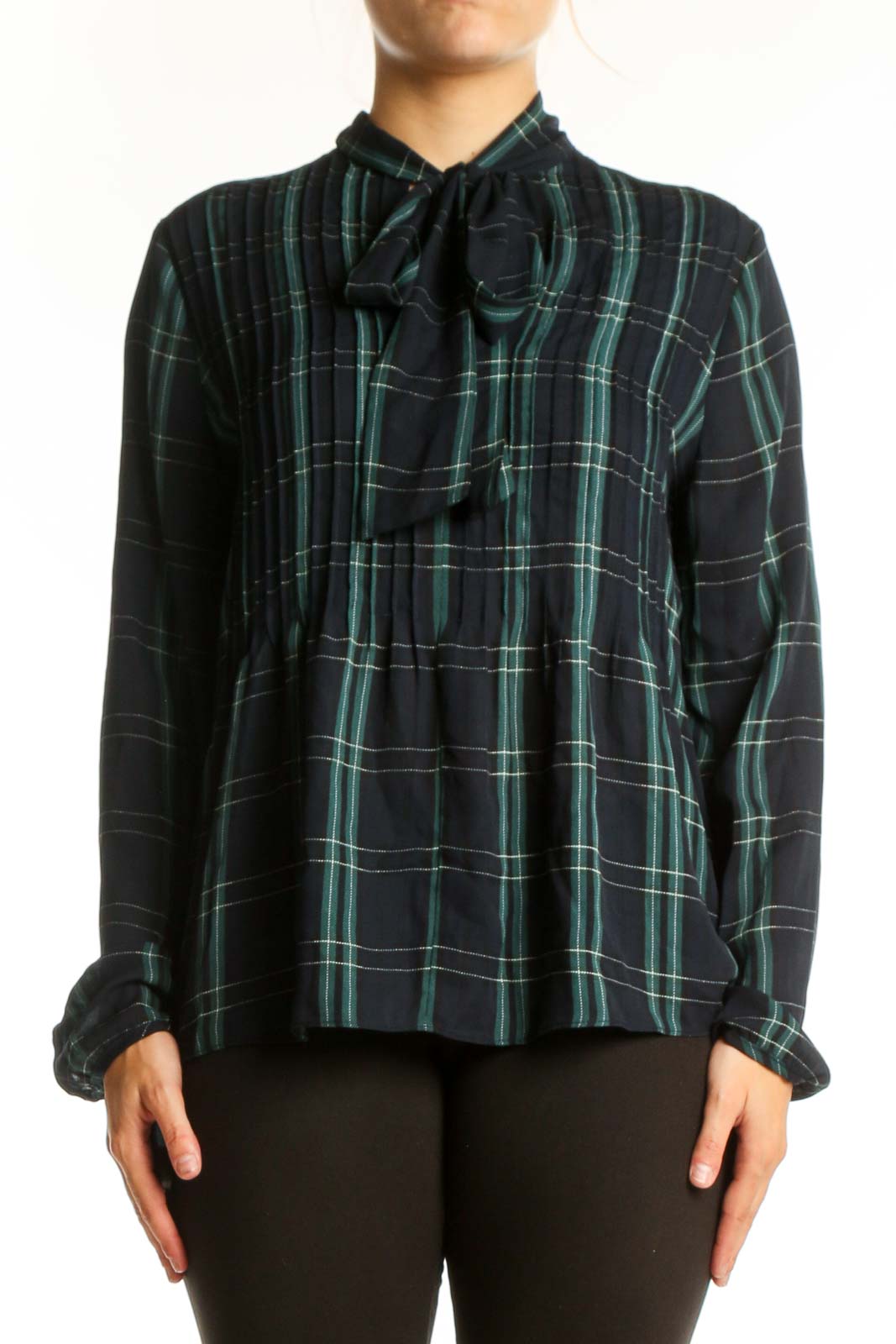 Navy and green plaid tie-neck blouse with long sleeves and A-line silhouette, front view