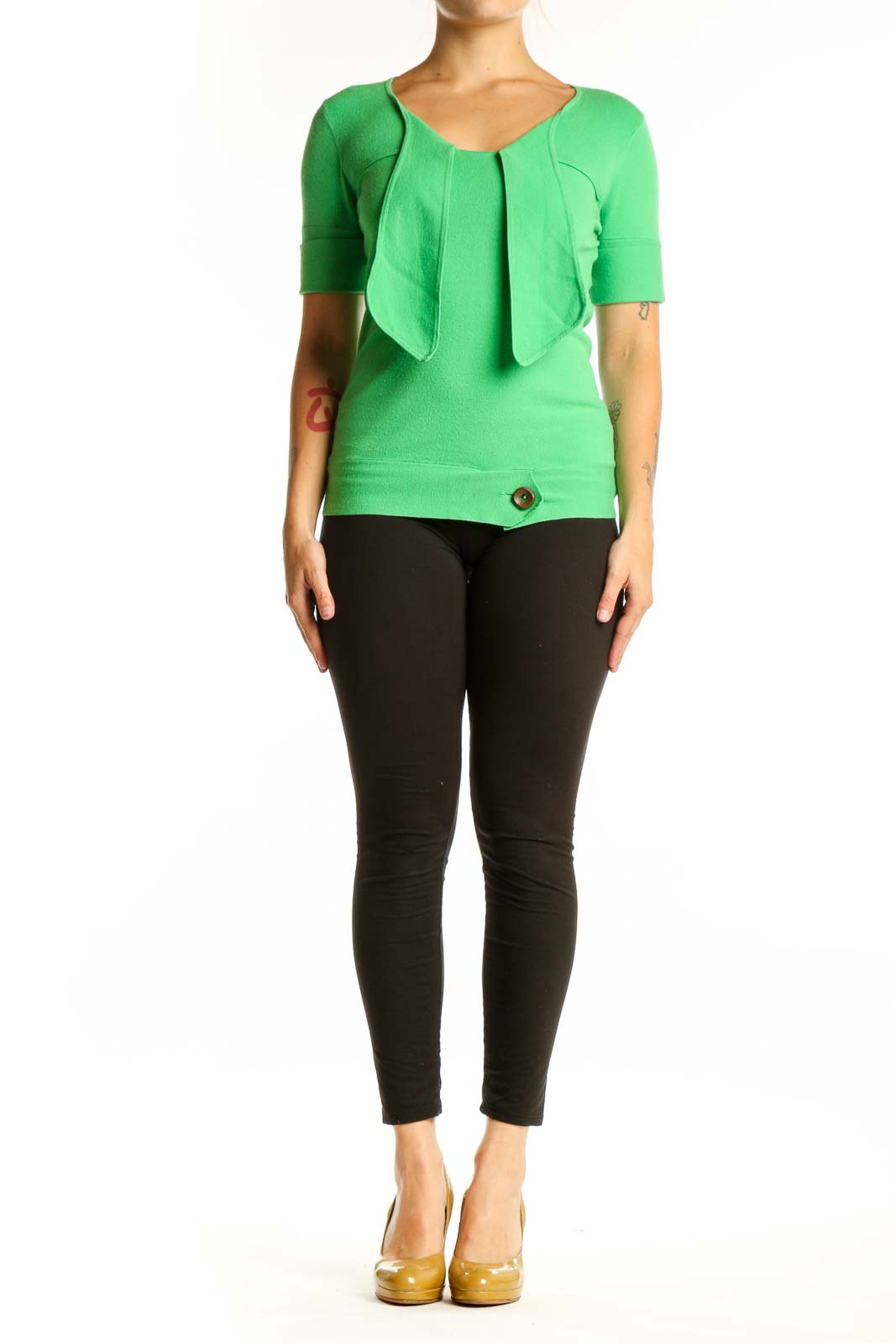 Green viscose knit top with ruffle neckline overlay and button detail, front view